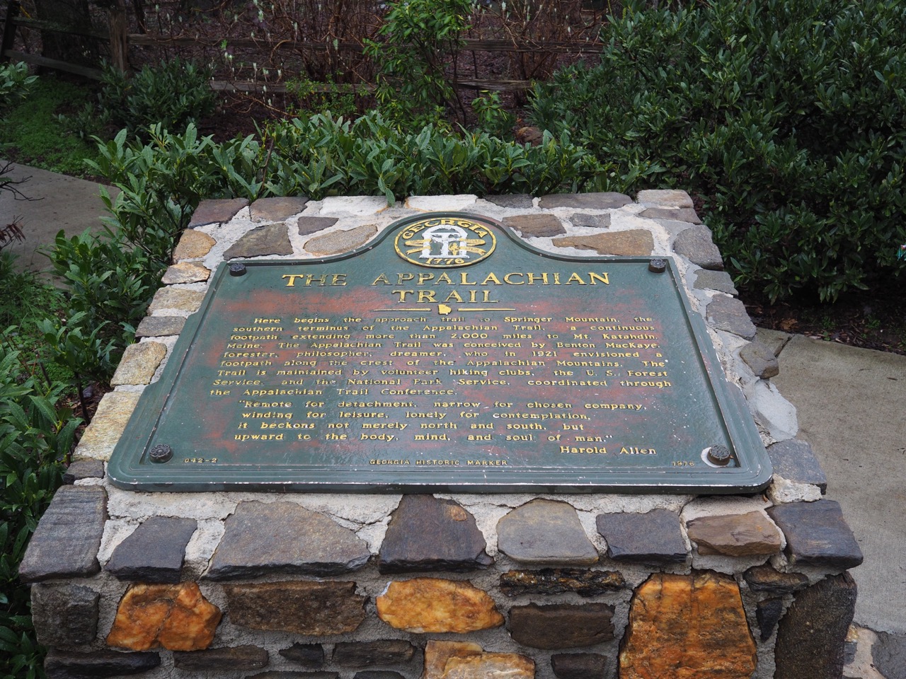 obligatory at plaque photo